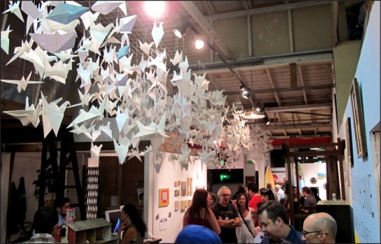 Origami birds flying overhead at PAS