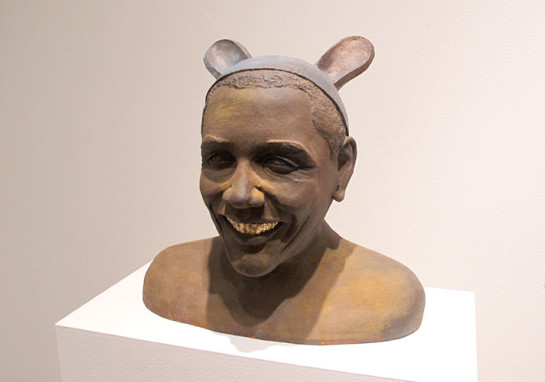 Japanese-born Nobu Nishigawara’s clay portrait of Barack Obama, entitled My American dream Is To Fit-in, 2013 clay, metal coating, gold leaf